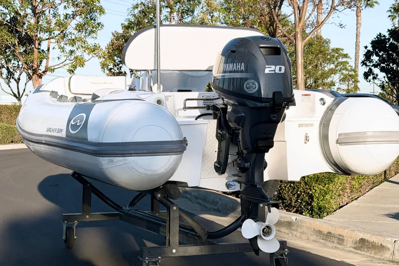 Slide: The Image of 2021 Walker Bay Generation 10 LTE boat with Yamaha 20 engine on a trailer. - 5