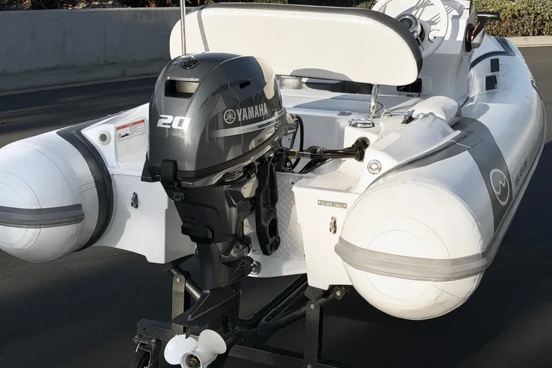 Slide: The Image of 2021 Walker Bay Generation 10 LTE boat with Yamaha 20 outboard motor. - 6