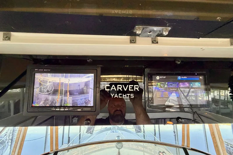 Slide: The Image of Control panel of 1987 Carver 4207 Aft Cabin Motor Yacht with dual monitors. - 23