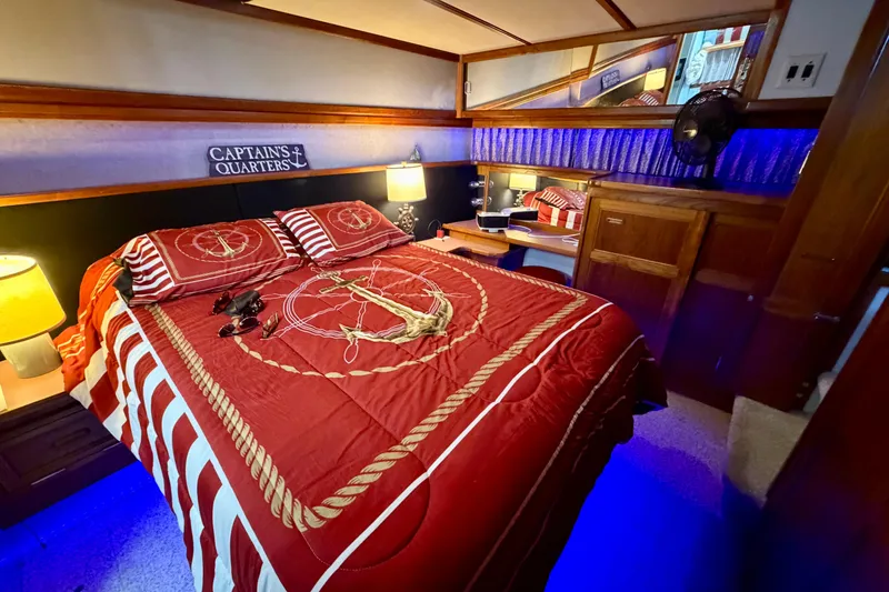 Slide: The Image of Cozy cabin bedroom in 1987 Carver 4207 Aft Cabin Motor Yacht with nautical decor. - 47