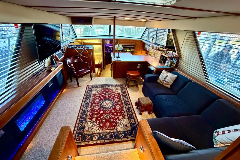 Slide: The Image of Luxurious interior of 1987 Carver 4207 Aft Cabin Motor Yacht with elegant furnishings. - 24