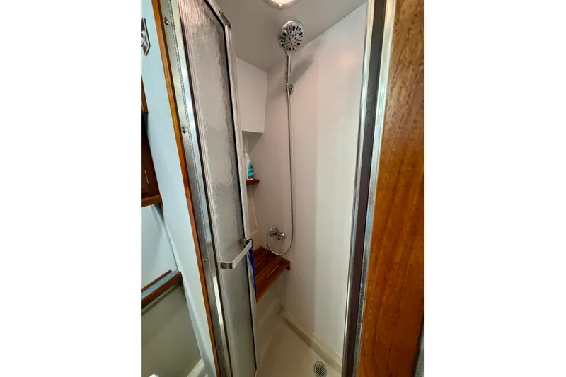 Slide: The Image of Shower area in 1987 Carver 4207 Aft Cabin Motor Yacht with wooden accents. - 41