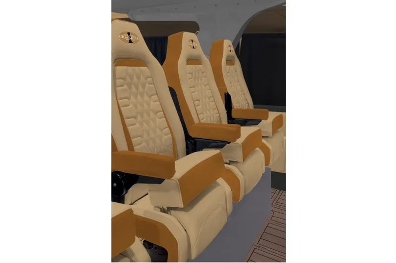 Slide: The Image of 2026 Cigarette Thunder boat interior with luxurious tan seats and modern design. - 5