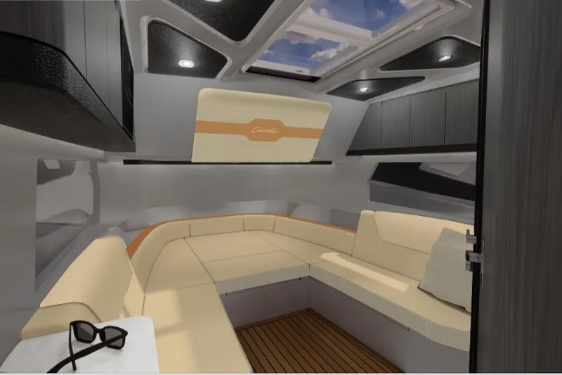 Slide: The Image of 2026 Cigarette Thunder boat interior with luxurious tan and cream seating, modern design. - 8