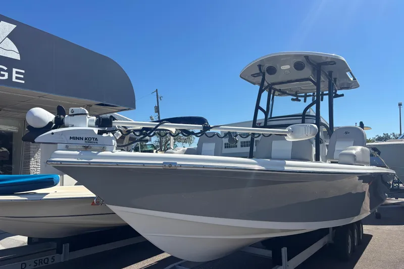 Slide: The Image of 2019 Sea Pro 248 Bay boat with Minn Kota Terrova motor displayed outdoors. - 5