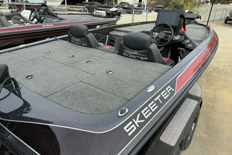 Slide: The Image of 2019 Skeeter ZX200 fishing boat with dual seats and advanced dashboard. - 14