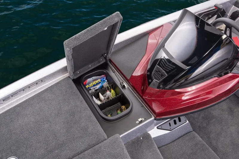 Slide: The Image of Manufacturer Provided Image: 2019 Skeeter ZX 200 boat with open storage compartment showing fishing gear. - 22