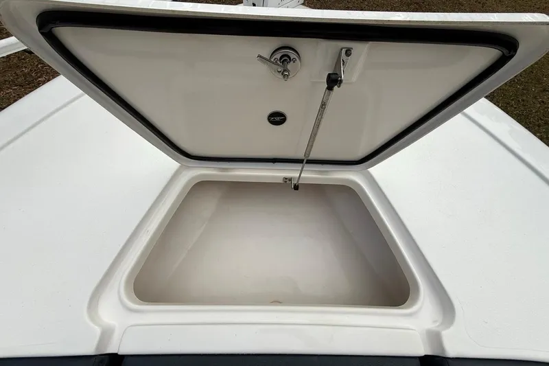 Slide: The Image of Open storage compartment on 2024 Tidewater 2300 Carolina Bay boat. - 30