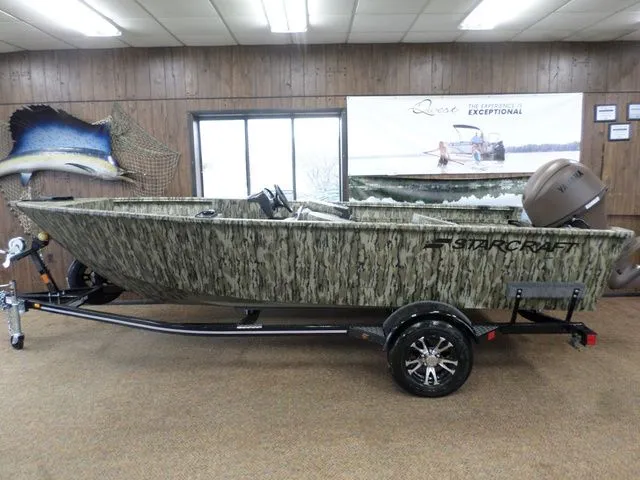 The Image of 2026 Starcraft Freedom 160 SC boat in a showroom. - 1