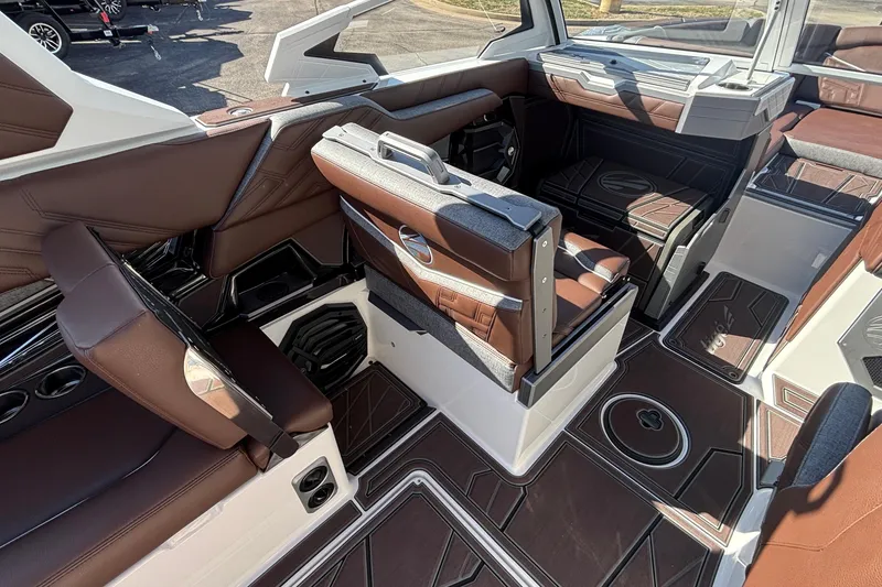 Slide: The Image of 2026 Tigé Ultré 25ZX boat interior with luxurious brown seating and modern design. - 45