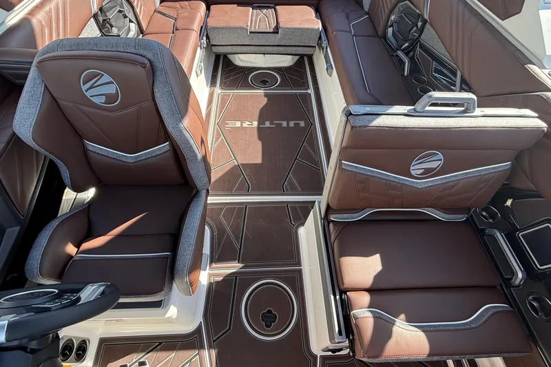 Slide: The Image of 2026 Tigé Ultré 25ZX interior with luxurious brown seating and modern design. - 50