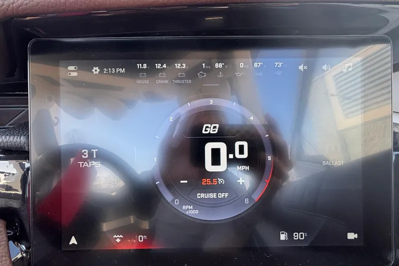 Slide: The Image of Dashboard display of 2026 Tigé Ultré 25ZX boat showing speed, RPM, and settings. - 55