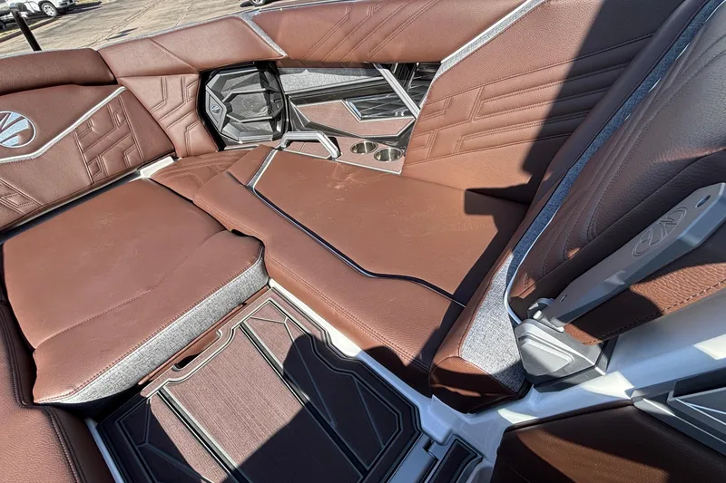 Slide: The Image of 2026 Tigé Ultré 25ZX boat interior with luxurious brown leather seating. - 67