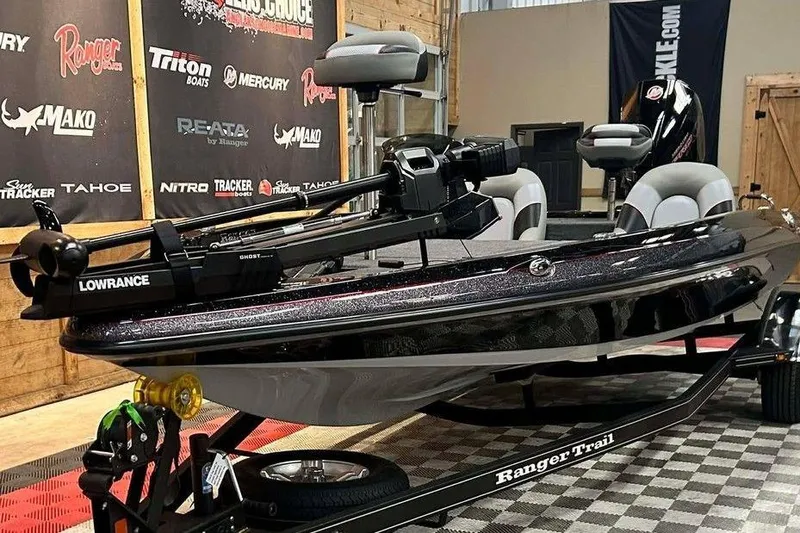 Slide: The Image of 2026 Ranger Z185 boat with Lowrance equipment on display in showroom. - 14