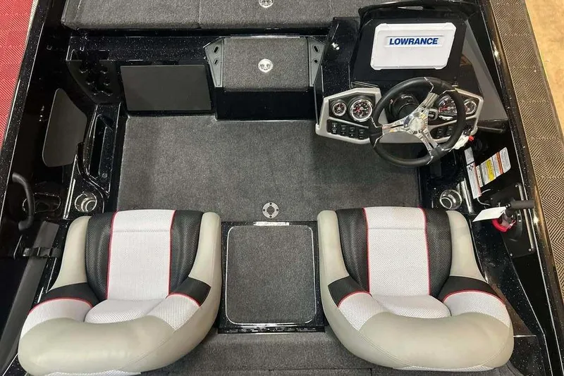 Slide: The Image of 2026 Ranger Z185 boat interior with dual seats and steering console. - 8