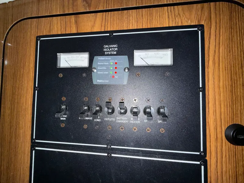Slide: The Image of 2008 Pursuit OS 285 Offshore control panel with galvanic isolator system. - 16