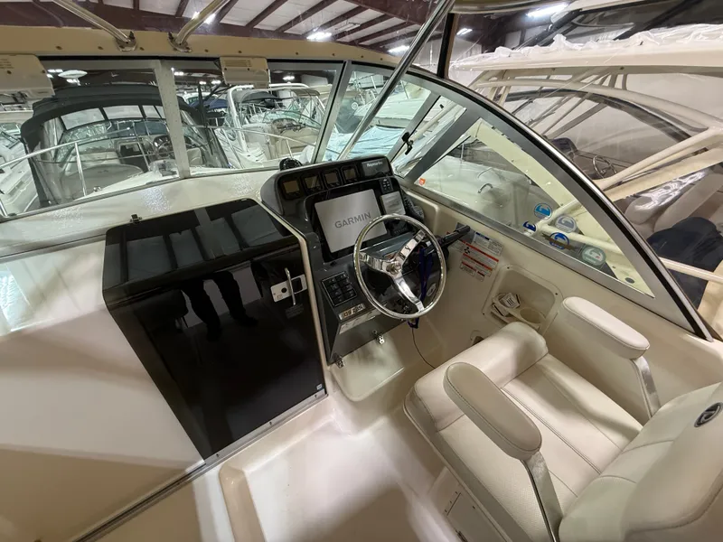 Slide: The Image of Interior view of a 2008 Pursuit OS 285 Offshore boat. - 5