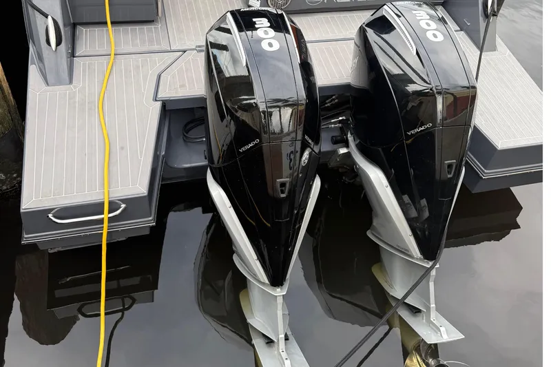 Slide: The Image of 2023 Cruisers Yachts 34 GLS OB with dual Mercury Verado 300 engines docked. - 21