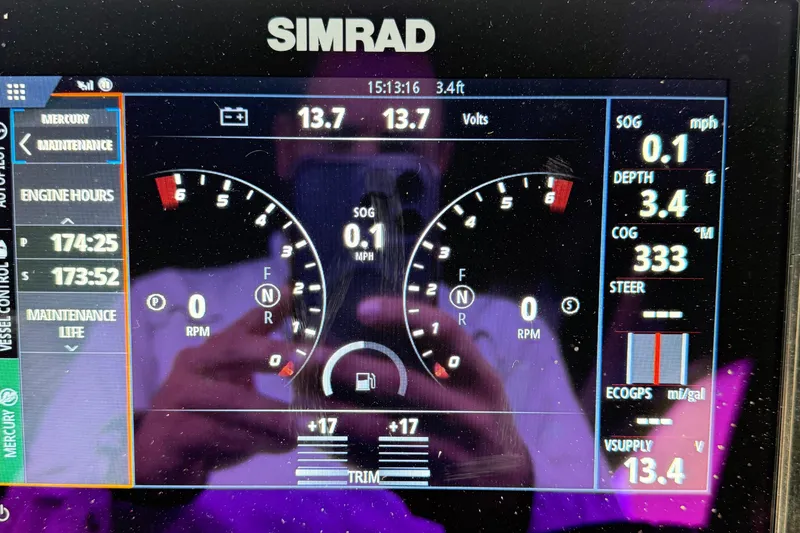 Slide: The Image of Simrad display on 2023 Cruisers Yachts 34 GLS OB showing engine and navigation data. - 25