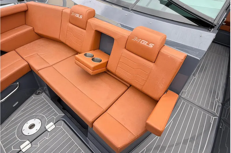 Slide: The Image of Luxurious seating on 2023 Cruisers Yachts 34 GLS OB with cup holders. - 8