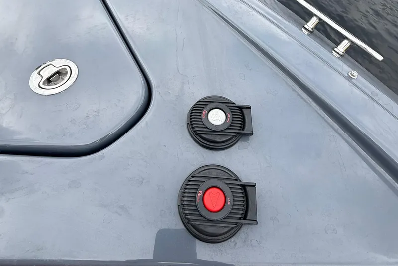 Slide: The Image of 2023 Cruisers Yachts 34 GLS OB deck with control buttons and latch. - 12