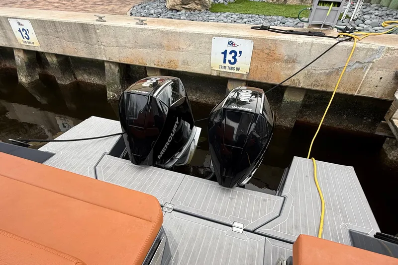 Slide: The Image of 2023 Cruisers Yachts 34 GLS OB with dual Mercury outboard engines at dock. - 19