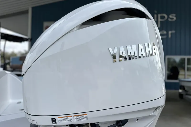 Slide: The Image of Yamaha outboard motor on 2026 Sea Hunt Ultra 245 SE boat, close-up view. - 21