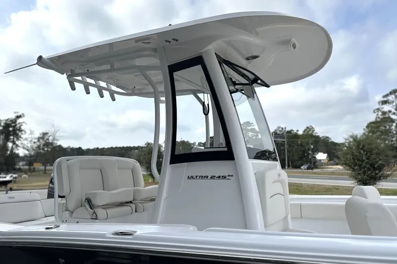 Slide: The Image of 2026 Sea Hunt Ultra 245 SE boat with sleek design and comfortable seating. - 25