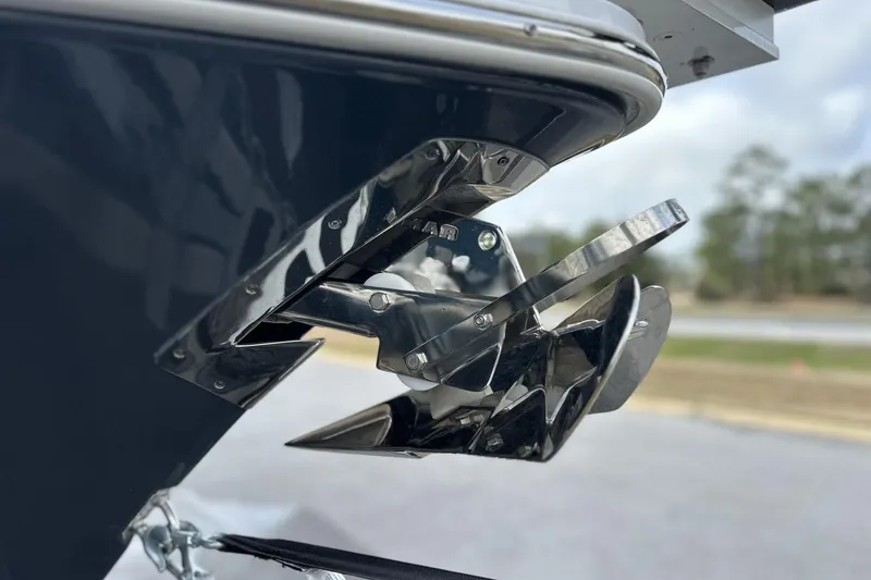 Slide: The Image of 2026 Sea Hunt Ultra 245 SE boat anchor detail with polished metal finish. - 31