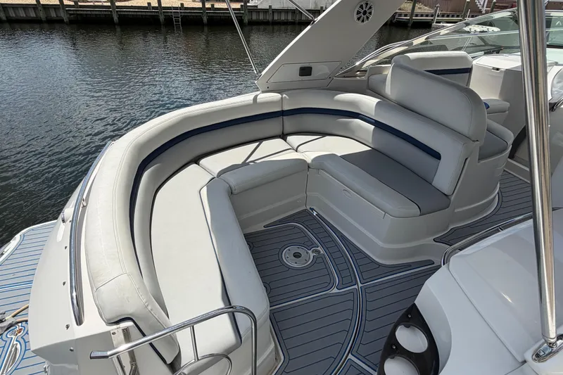 Slide: The Image of 2006 Monterey 350 Sport Yacht with spacious seating area and elegant design. - 26