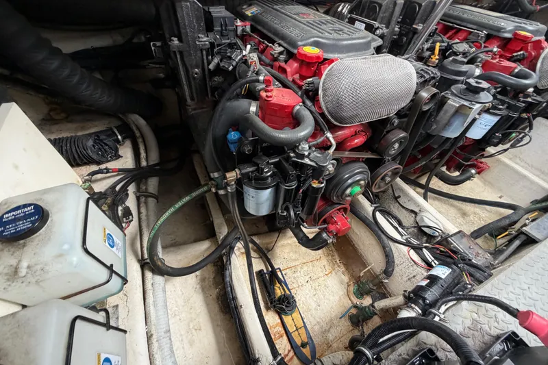 Slide: The Image of Engine compartment of a 2006 Monterey 350 Sport Yacht, showcasing mechanical components. - 44
