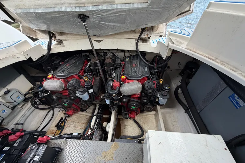 Slide: The Image of Engine compartment of a 2006 Monterey 350 Sport Yacht with dual engines visible. - 48
