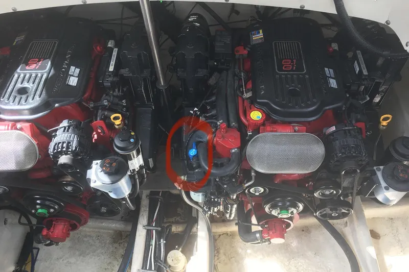 Slide: The Image of Engine compartment of a 2006 Monterey 350 Sport Yacht, featuring dual engines. - 9