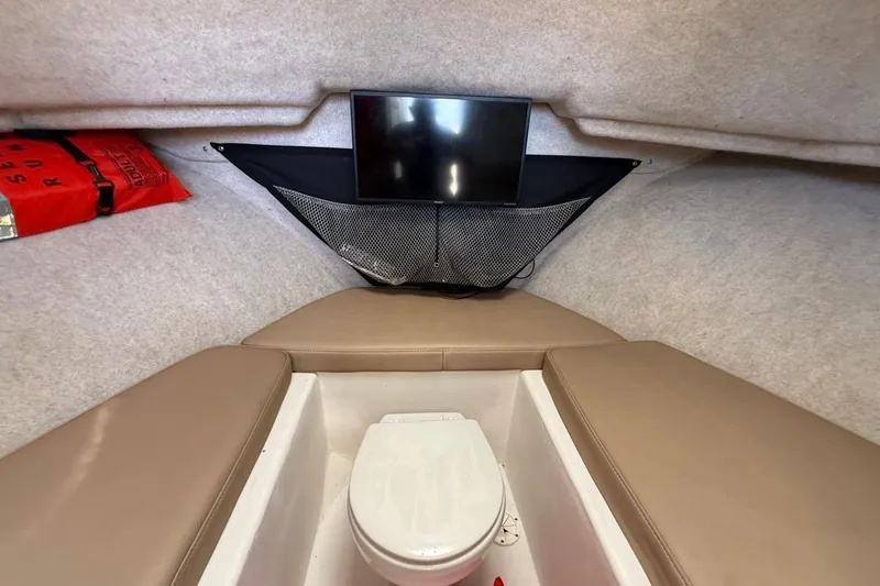 Slide: The Image of 2019 Parker 2520 XLD Sport Cabin interior with toilet and storage net. - 21