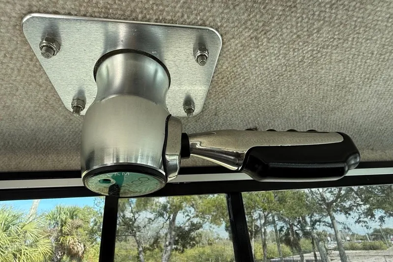 Slide: The Image of Ceiling-mounted handle inside 2019 Parker 2520 XLD Sport Cabin boat. - 25