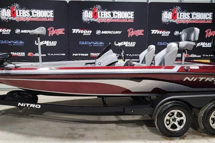 Slide: The Image of 2026 Nitro Z19 XL Pro boat displayed at Anglers Choice event. - 0