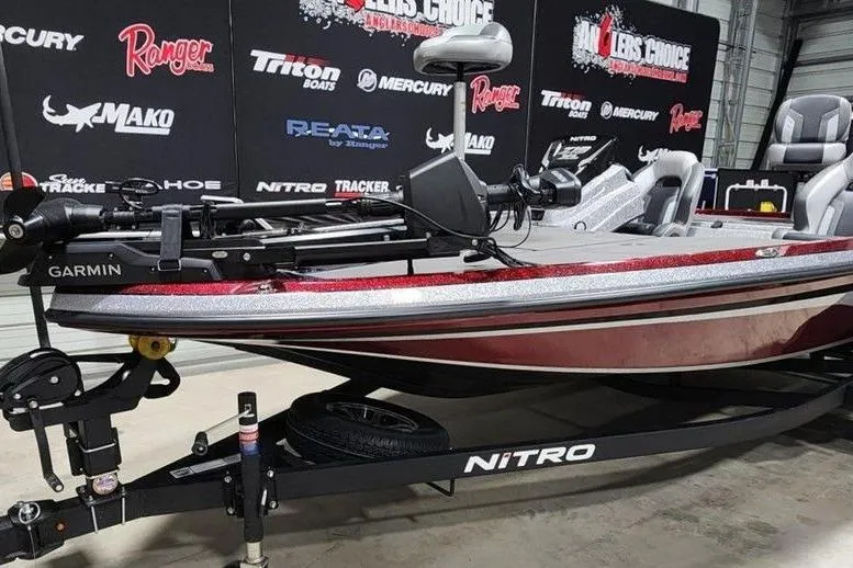 Slide: The Image of 2026 Nitro Z19 XL Pro fishing boat on display with Garmin equipment. - 3