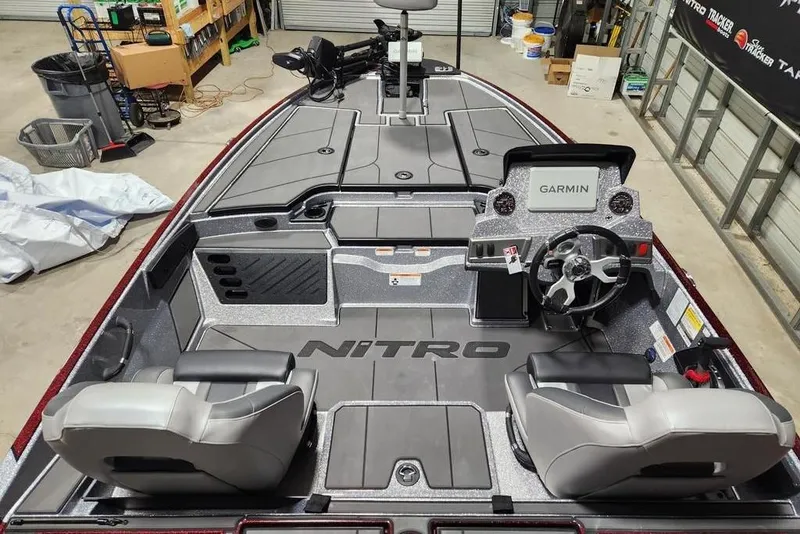 Slide: The Image of 2026 Nitro Z19 XL Pro boat interior with Garmin system and dual seating. - 6