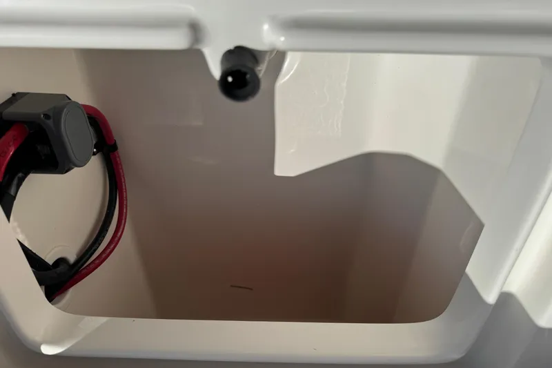 Slide: The Image of Compartment of 2025 Key West 219 FS boat with wiring visible. - 19