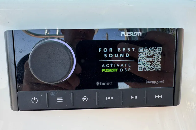 Slide: The Image of Fusion audio system on 2025 Key West 219 FS boat, featuring Bluetooth and SiriusXM compatibility. - 40