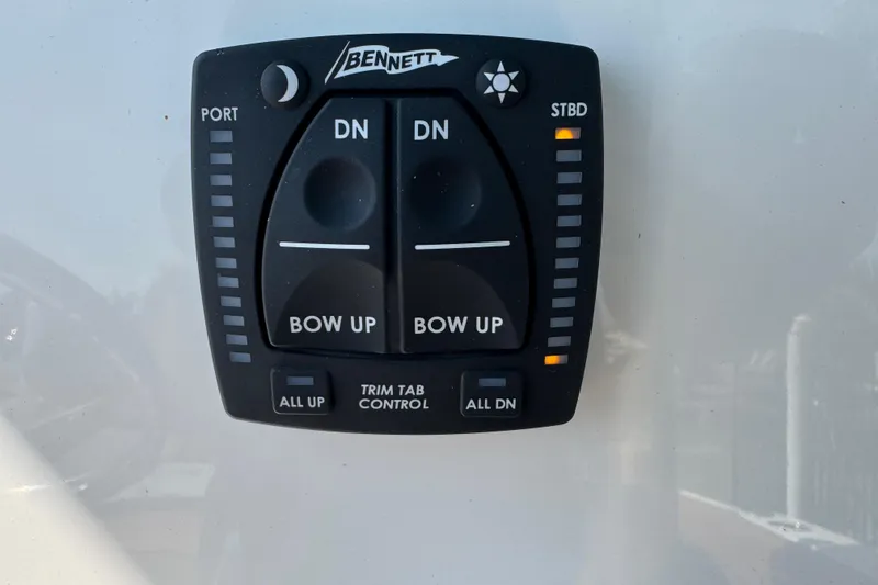 Slide: The Image of Bennett trim tab control panel on 2025 Key West 219 FS boat. - 41