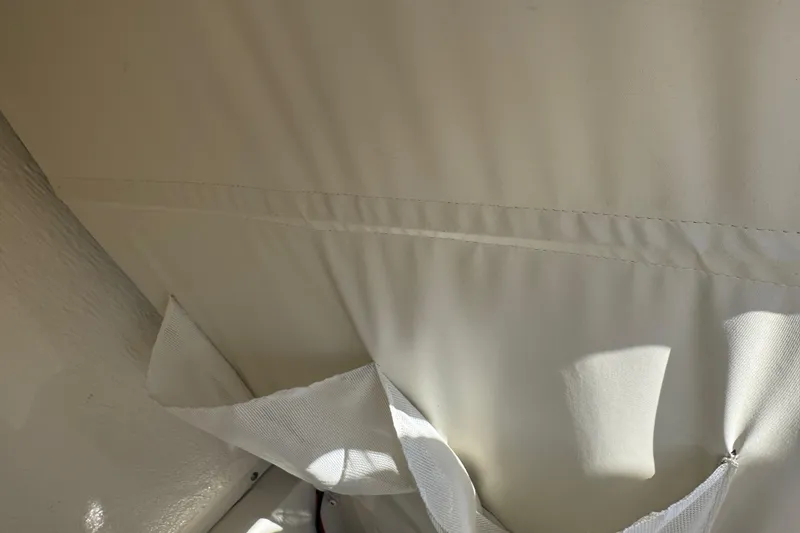 Slide: The Image of Interior detail of 2025 Key West 219 FS boat, featuring fabric and stitching. - 50