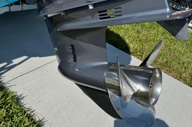 Slide: The Image of Close-up of a 2025 Key West 219 FS boat propeller on a sunny day. - 7