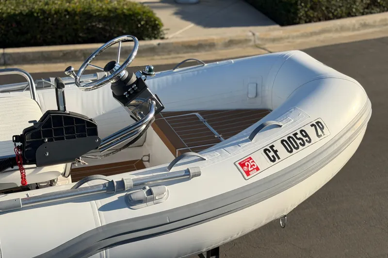 Slide: The Image of Inflatable boat with steering wheel, registration CF 0059 ZP, Caribe C10X 2014 model. - 11