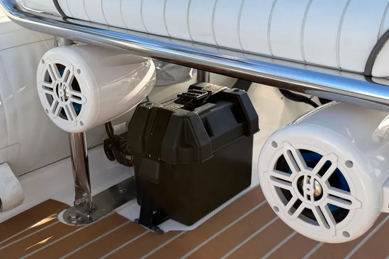 Slide: The Image of Boat speakers and battery box on a 2014 Caribe C10X deck. - 6