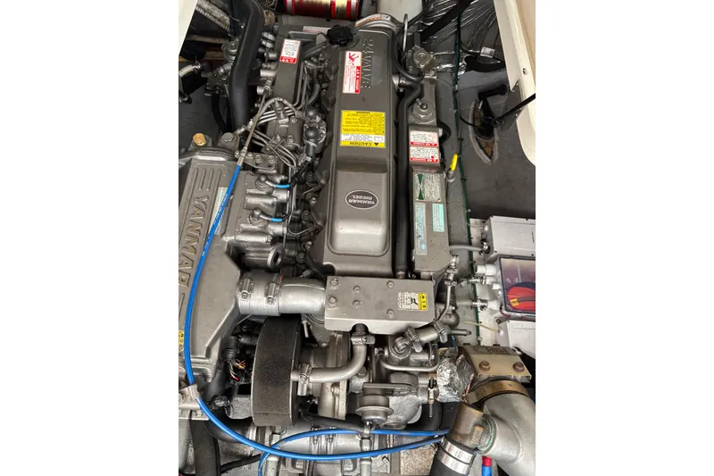 Slide: The Image of Engine of a 2006 Back Cove 29 boat, featuring Yanmar components. - 10
