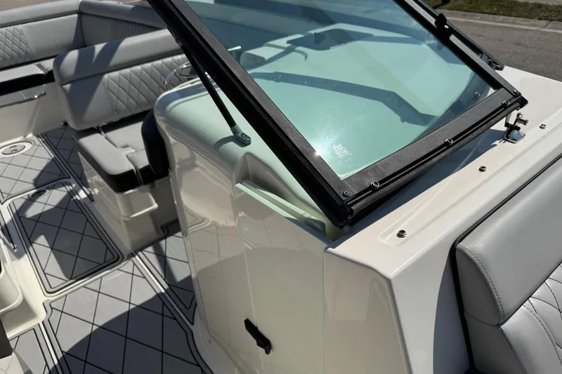 Slide: The Image of 2019 Sea Ray SDX 270 Outboard boat interior with seating and windshield. - 38