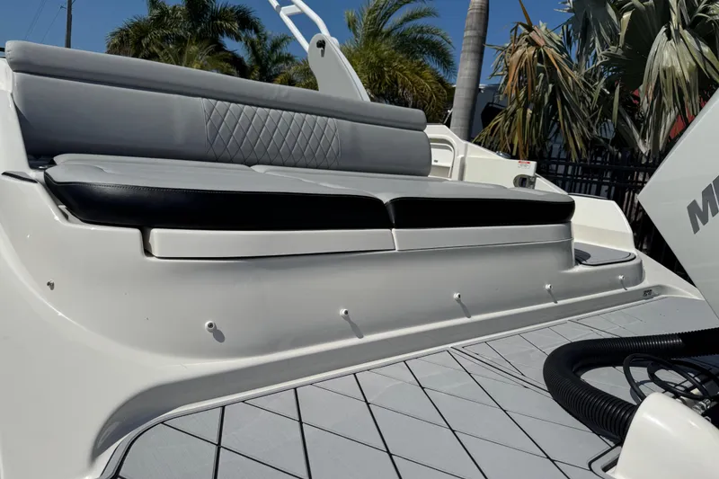 Slide: The Image of 2019 Sea Ray SDX 270 Outboard boat with sleek seating and modern design. - 7