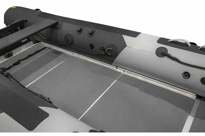 Slide: The Image of 2023 West Marine MH400 inflatable boat interior with durable flooring and secure attachments. - 3