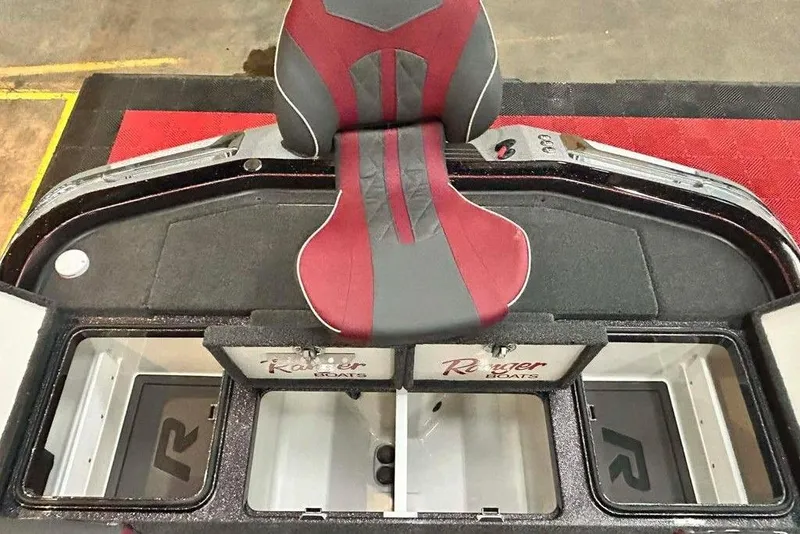 Slide: The Image of 2014 Ranger Z521R Cup-Equipped boat interior with red and gray seating. - 14